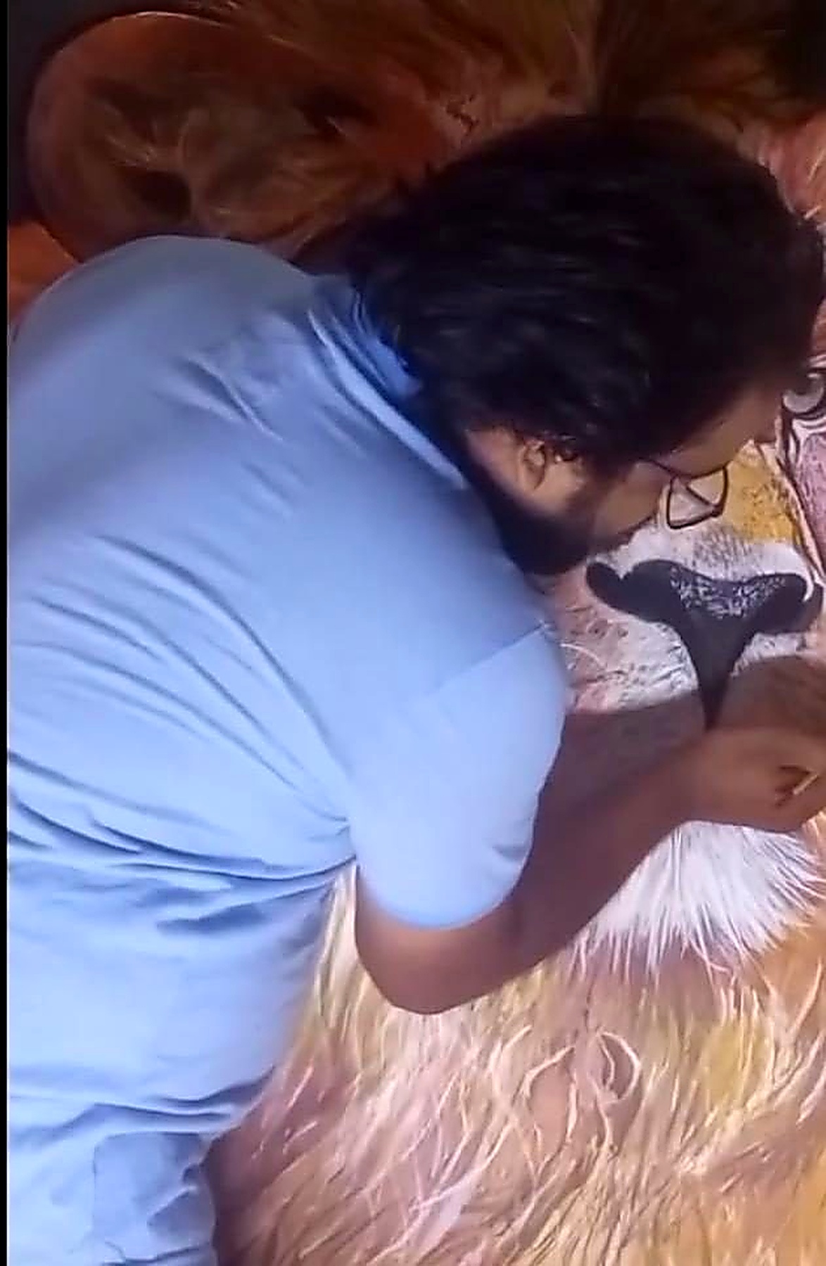 Harsh painting massive lion canvas in Rishikesh studio